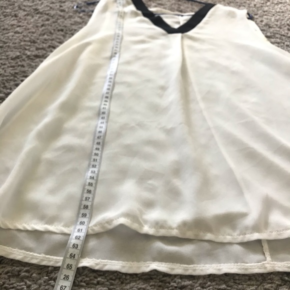 White sleeveless see through blouse. - Picture 4 of 5